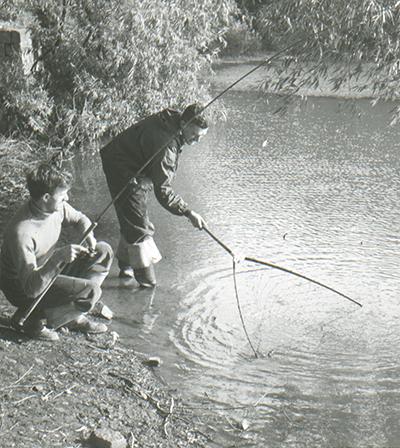 Pete landing a fish with Maurice Ingham netting